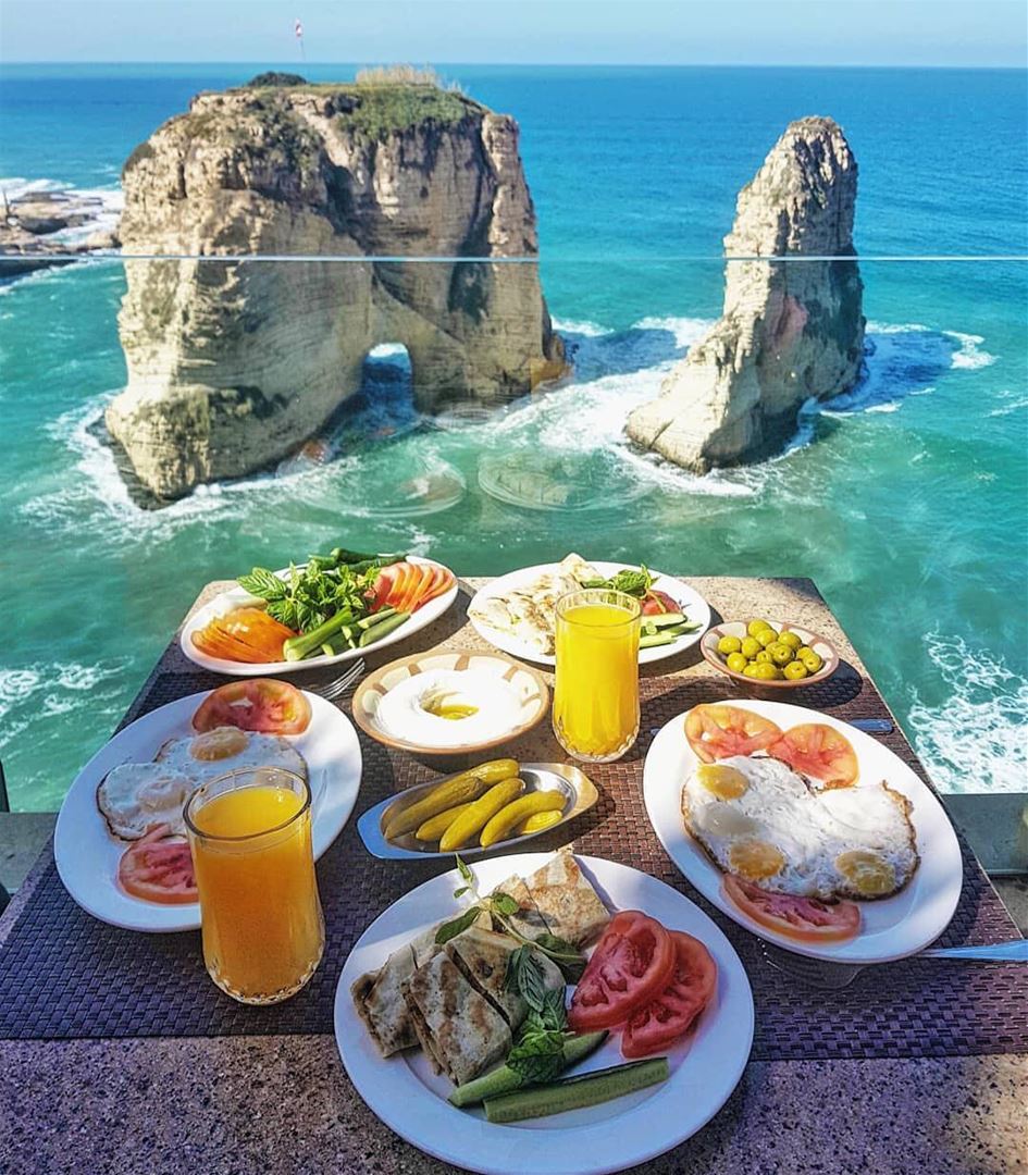 Breakfast with an Iconic view! 💙 Who's hungry? 😊By @framewithaview ... (Raouche Rock , Beirut , Lebanon)