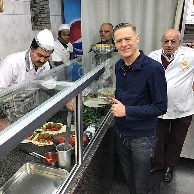 Bryan Adams enjoying Sahyoun's delicious falafel in Beirut before his...