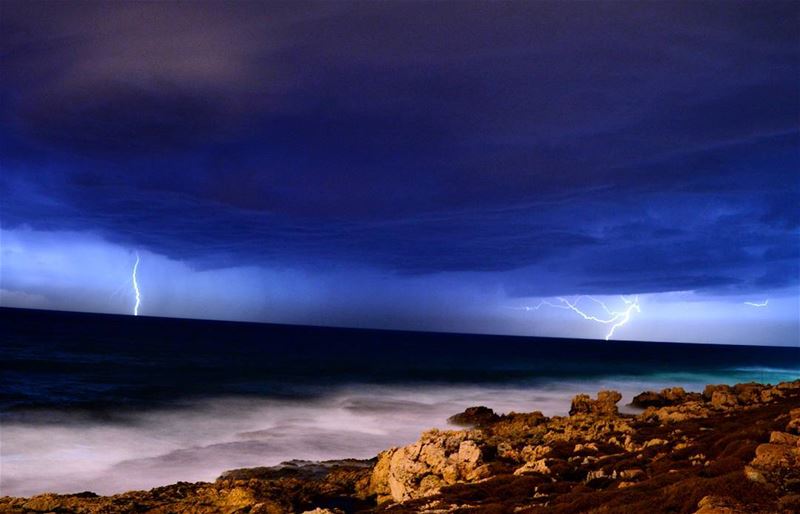  catchinglightning lightning sky clouds winter wind rain waves beach ocean... (Amchit)