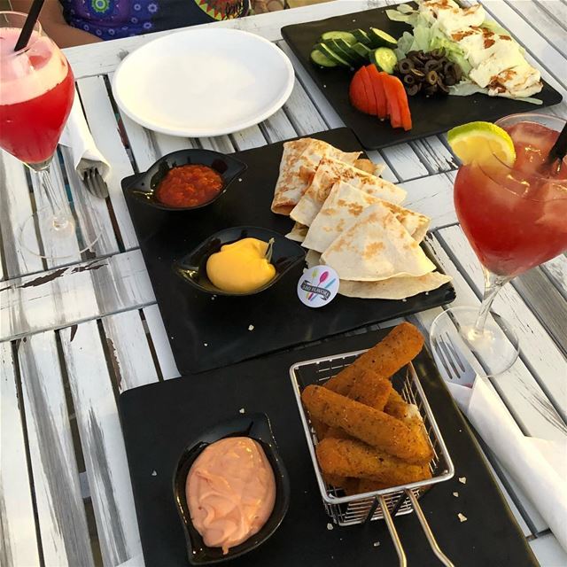 Chicken quesadillas, mozzarella sticks and halloumi salads!! Perfect trip � (Anfeh Al-Koura أنفه الكورة)