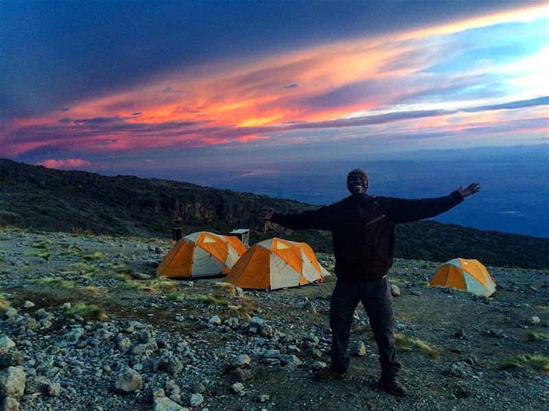 Cosmic  Sunset on our arrival to Karanga camp 4040m with our head guide... (Mount Kilimanjaro)