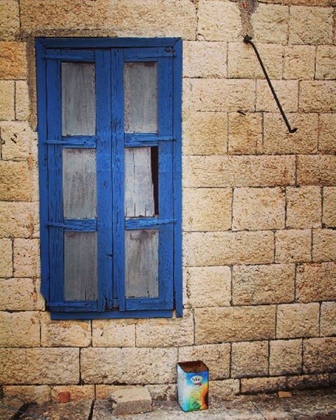 Courtesy of a street. window  street  village  mountain  house  home ... (Douma Souks)