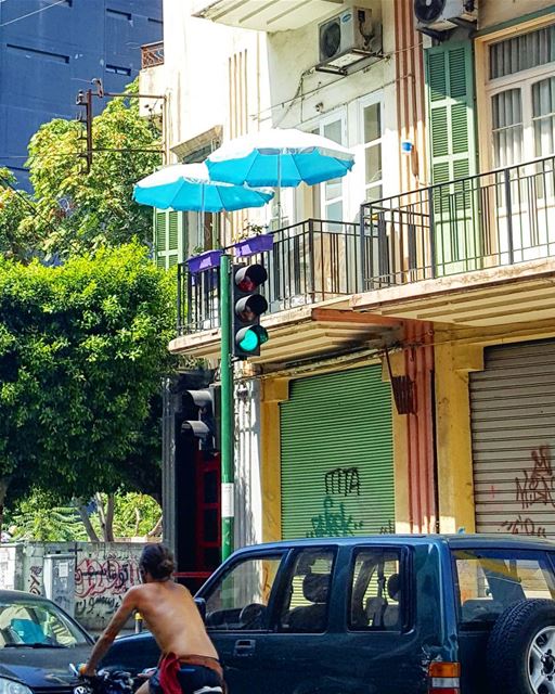 Cyclist & pop of blue 🚴‍♀️... good morning! ... Lebanon  hiddenbeirut ...