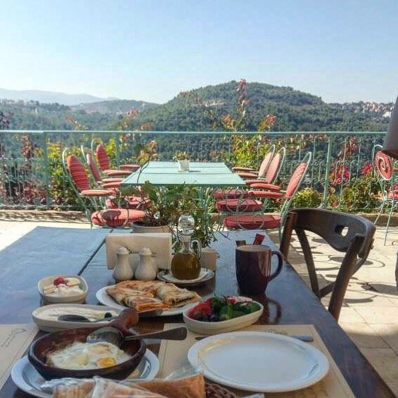 Delicious Lebanese breakfast with an amazing view at @deiraloumara ... (Deir al Oumara)