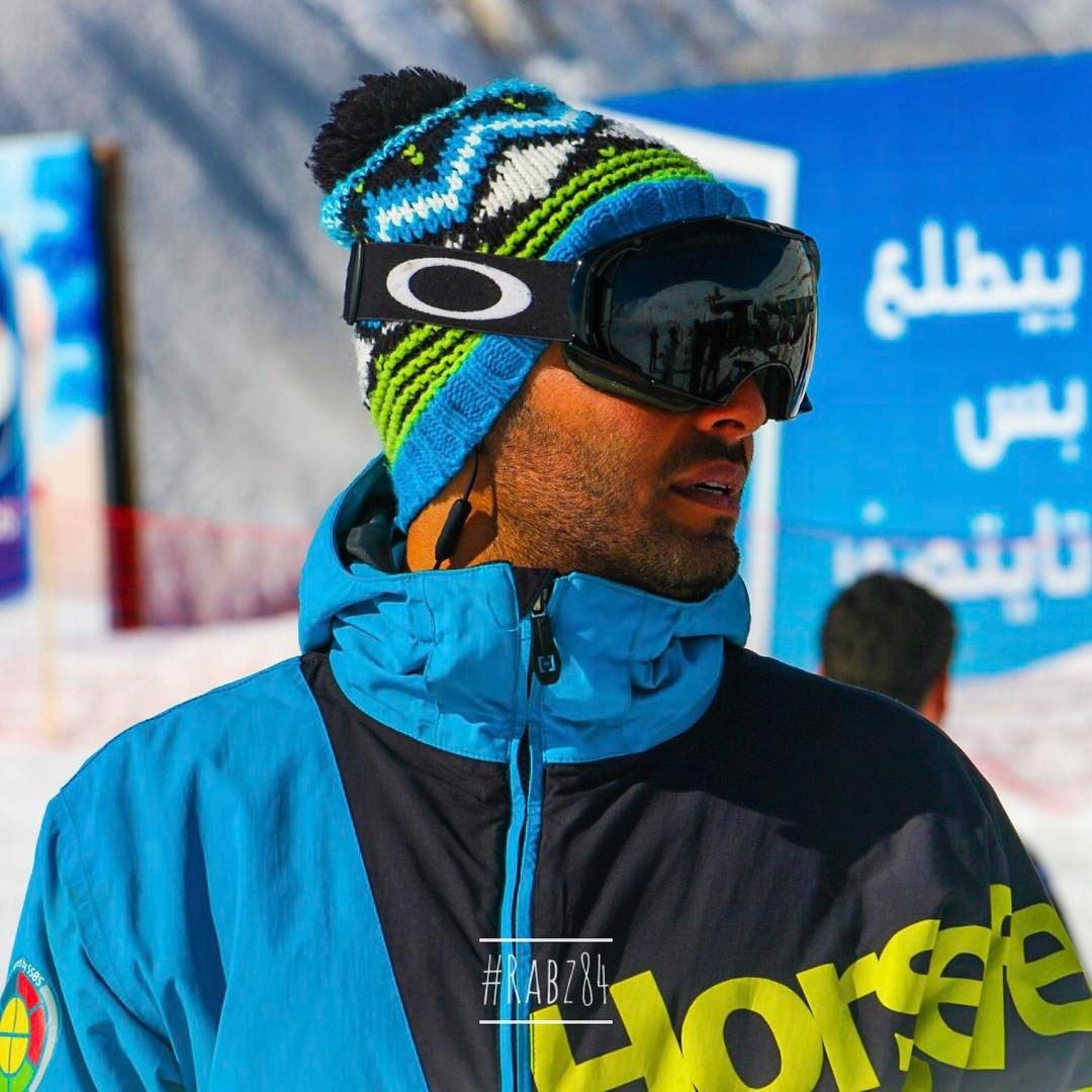 Every snowboarder's got his moment; ear phones, profile look and fashioned... (Mzaar Kfardebian Ski Resort)