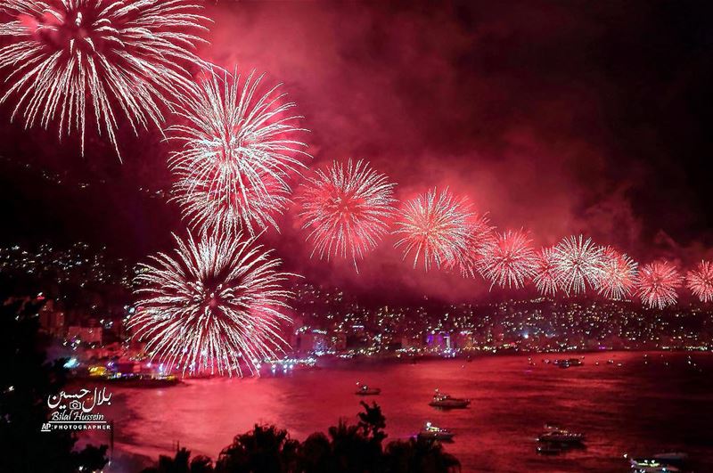 Fireworks explode over the coastal town of Jounieh, Lebanon, Thursday,...
