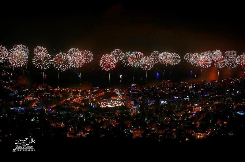 Fireworks explode over the coastal town of Jounieh, Lebanon, Saturday,...