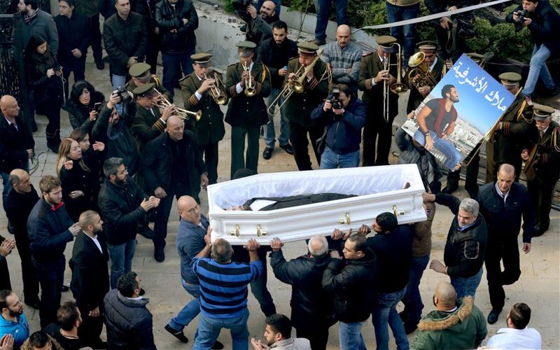 Friends and relatives of Elias Wardini, who was killed in Istanbul, carry his coffin during the funeral in Church of Our Lady in Beirut.