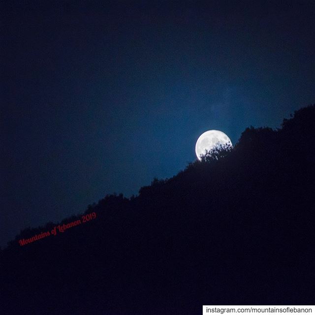 Full moon playing hide and seek behind the hills  nahreljoz ........ (Naher El jouz)