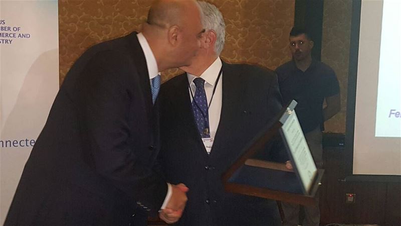 @georgeschehwane offers an award to Mr. Hajji Roussos - President of the... (Limassol, Cyprus)