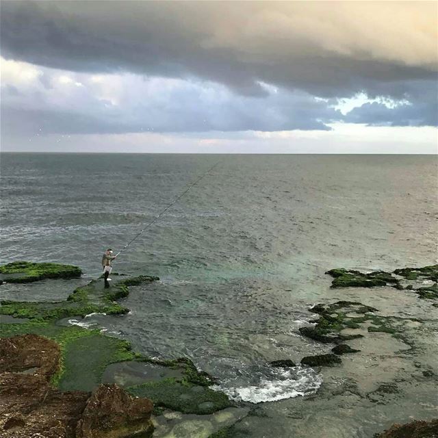 Good morning everyone 🎣💚.. raouche  fishermen  beirut  lebanon ... (Raouche Rock , Beirut , Lebanon)