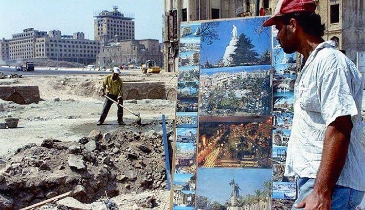 Good morning from #Beirut Martyrs Square , A Lebanese vendor sells posters of pre-civil war central Beirut  Sept. 6, 1994. 