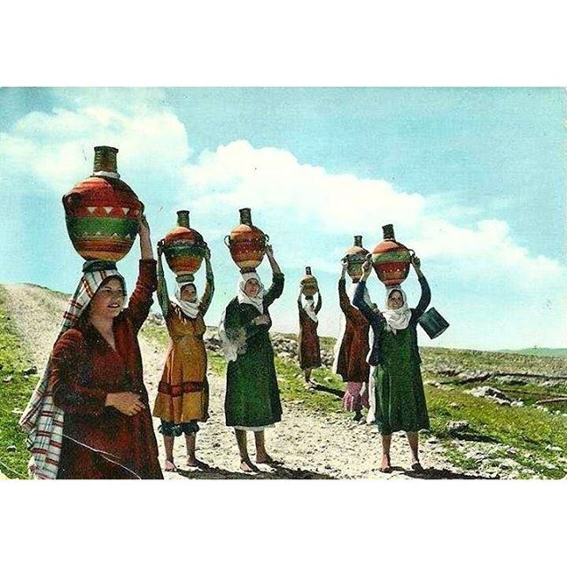 Good Morning From Bekaa - 1945 , Women with their water filled jar .