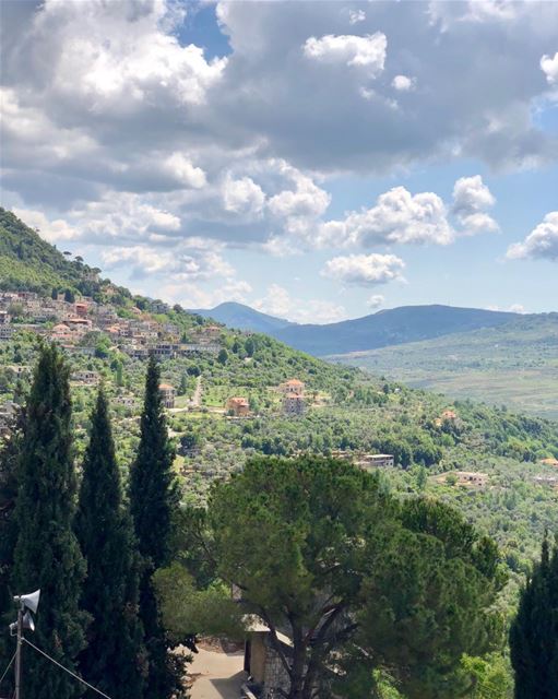 Greenery, mountains, cliffs and valleys as far as the eye could see. ...
