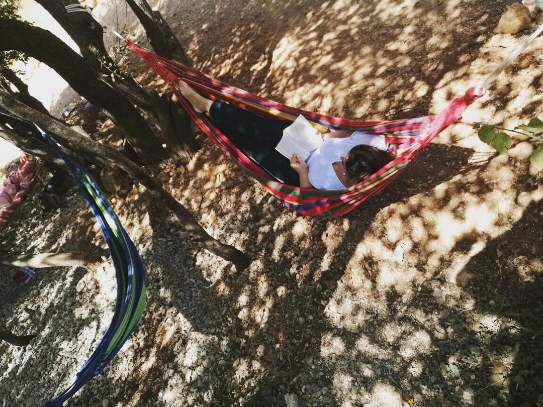 Happiness is reading a book in a hammock. 📕⛺️ CedarsGroundCampsite ... (Cedars Ground Campsite)