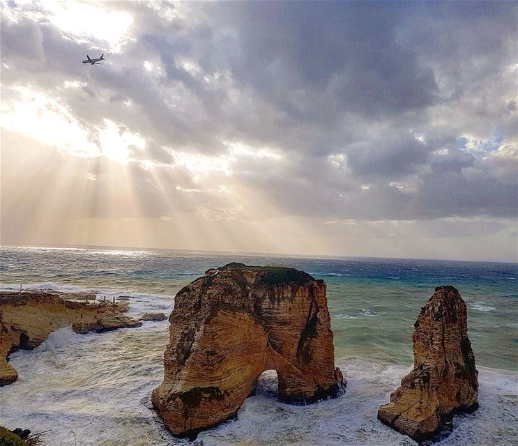 Happy sunday❤❤❤❤ sunrays  clouds  rocks  seaside  airplane  tourist ... (Raouché)