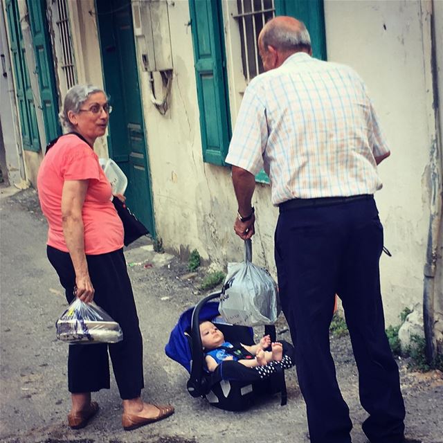 “He’s not mine” the man says ...  baby  streetphotography  lost  elder ... (Mar Mikhael-Armenia The Street)