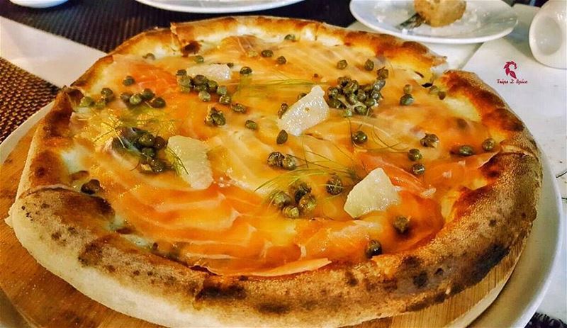 Heaven is a place on earth with Salmon Pizza 🍕😍 .----------------------- (Society Bistro)