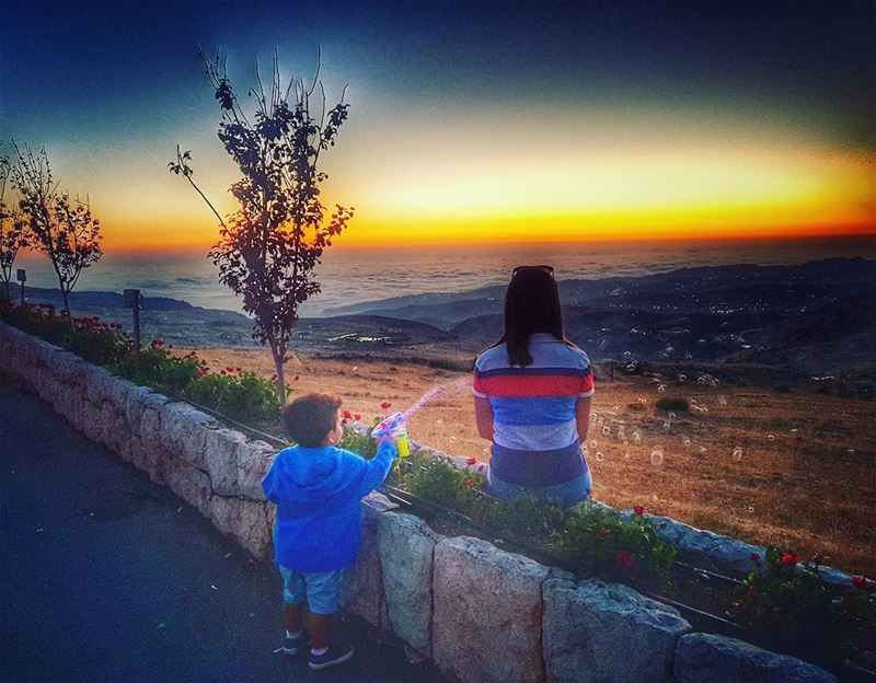 His  watergun meant for him much more than the amazing  sunset ahead 💏... (Qanat Bakish, Mont-Liban, Lebanon)