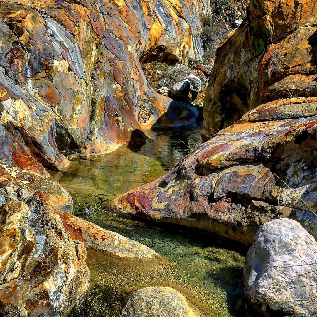 How about a dip? colored  rocks  clear  water  stream  sand  canyon ...