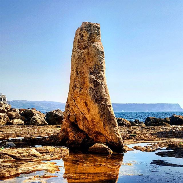 How awesome is this  rock ? Standing alone facing the tides 🌊 and never... (Anfeh - Koura sea)