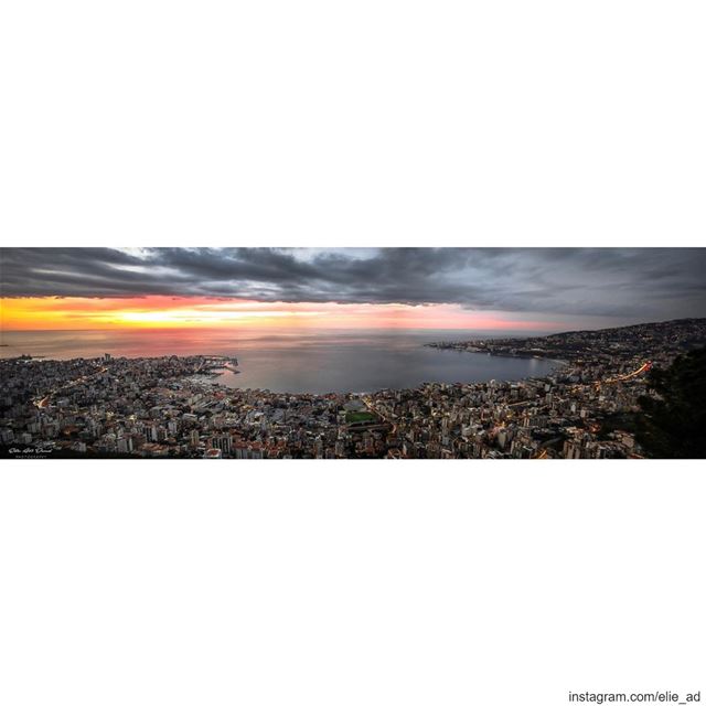 Hypnotic 🌅  sunset  bay  clouds  skies  gulf  light  city  mesmerizing ... (جونية - Jounieh)