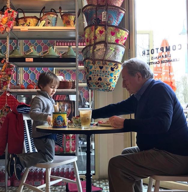 I just love this picture.. Grandad & grandson sharing mezze...... what I... (Comptoir Libanais)