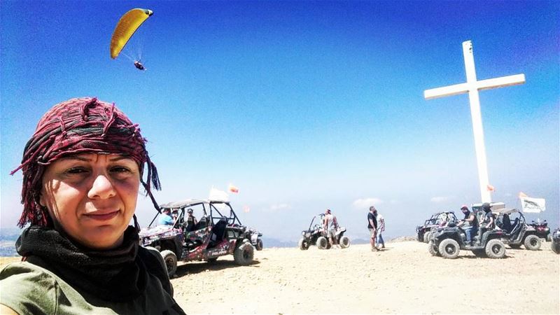 I was taking selfie with friends behind me then a paragliding showed up in...