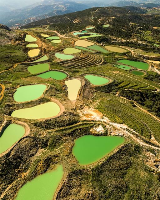 Imagine all those ponds having the same color, would the picture be... (Kfarselwan)