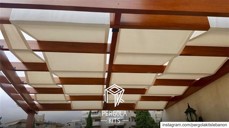 Iroko Wood, Attached Pergola with Fabric Roofing.  PergolaKitsLebanon in... (Hazmieh)