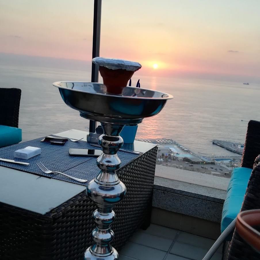 It is  shisha  time  sunset  rooftop  seaviews  panoramic  relaxingday ... (Rotana Raouche Arjan)