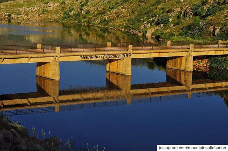 Just a bridge and its reflection during golden hour...... roadtrip ... (Lac de Qaraaoun)