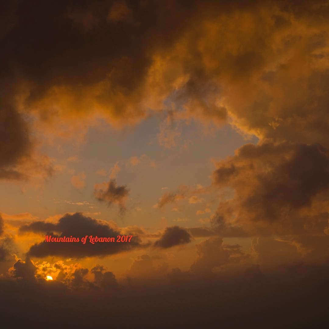 Just a regular sunset behind the stormy clouds... sunsets  cloudedsunset... (Balloûné, Mont-Liban, Lebanon)