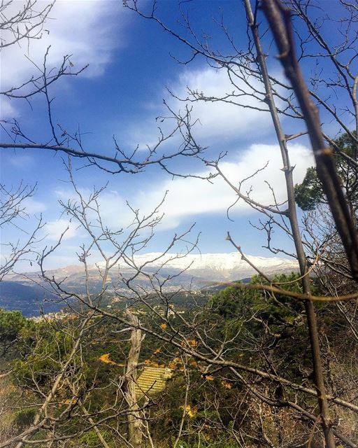 Last residue of snow over the mountain  mountain  snow  bluesky  clouds ... (Dhour choueir)