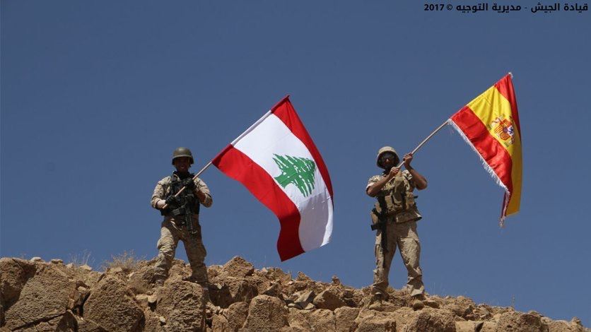 Lebanese Army Raising Both the Lebanese and Spanish Flags After Advancing on ISIS Holds in Lebanon and Following the Terrorist Attack in Spain
