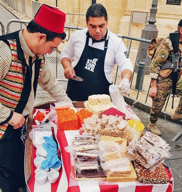 Lebanon as it is. A man in traditional 'tarboosh' hat, another one with... (Beirut, Lebanon)