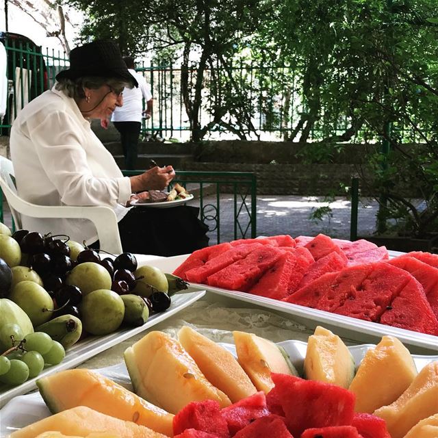  lebanon beirut old woman eating food fruits melon red yellow grapes pears... (Beirut, Lebanon)