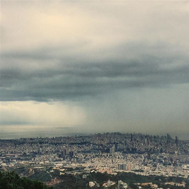 Localized shower over the peak of Beirut  landscape  seascape  skyscape ...