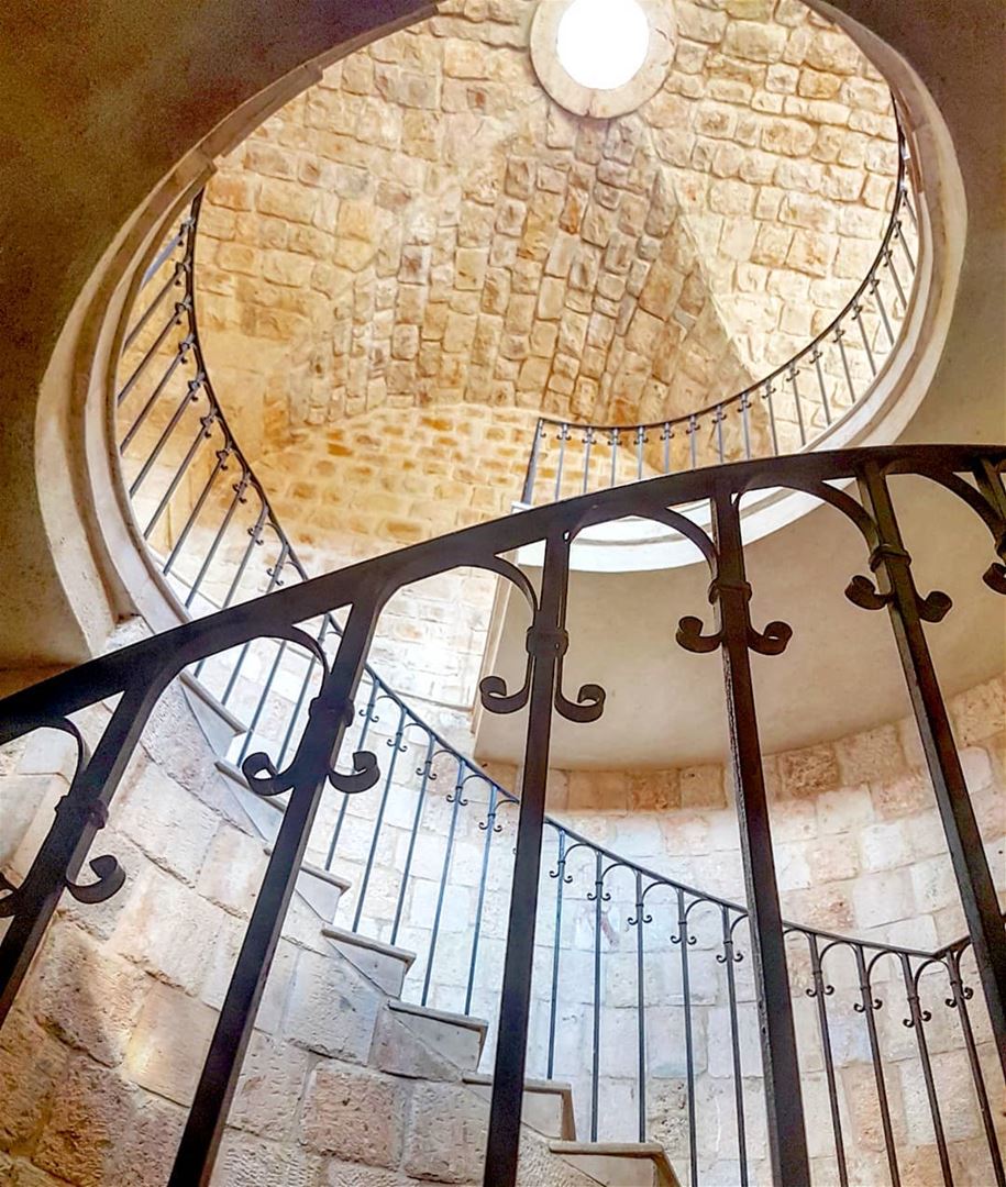 Looking up the beautiful stairs and wrought iron railings of the winery, a... (Ixir Winery)