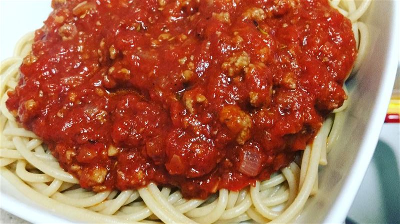 LUNCH ! Brown Pasta Bolognese 🍝 🍷 Cheers to the weekend 😇 .. lunch... (Beirut, Lebanon)