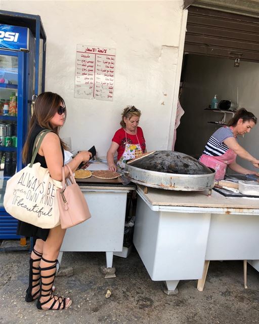 Manoosh stand with freshly rolled out dough.  beirutfood  flatbread ...