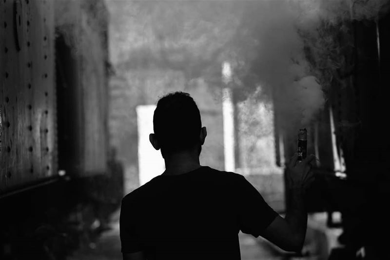 🇱🇧 Me in Black and White with smoke .Photo by @elierak ..  بيروت_مش_بشعة (Tripoli Train Station Terminal)