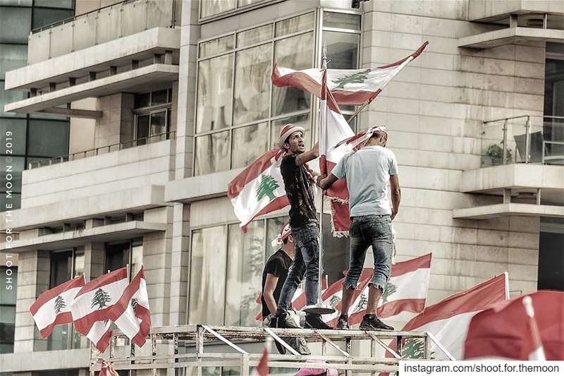 Men’s red flower..... freedom  red  lines  liberty ... (Martyrs' Square, Beirut)