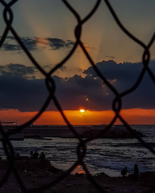 My Bike said that fences will melt when she looks through them.. ..☀️🍃... (Beirut, Lebanon)