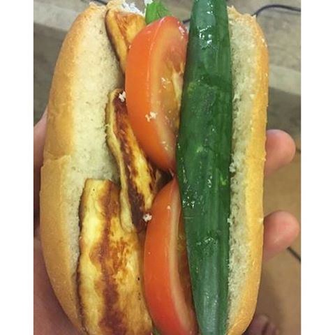 My Breakfast today is as simple as that... Grilled Halloumy with cucumber & tomato in a bread ...