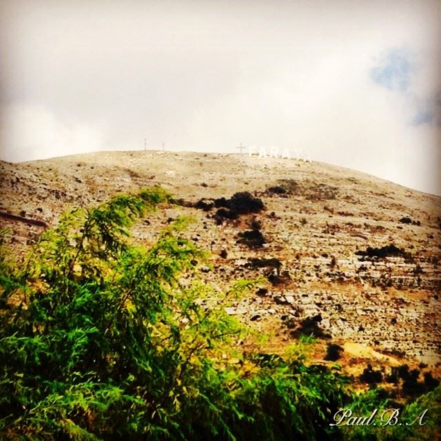  nature green tree grey clouds blue sky high mountain cross eye of GOD...