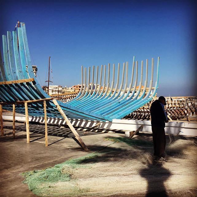 Net working at Tyre's old port  fisherman  streetphotography  sea  port ... (Tyre, Lebanon)