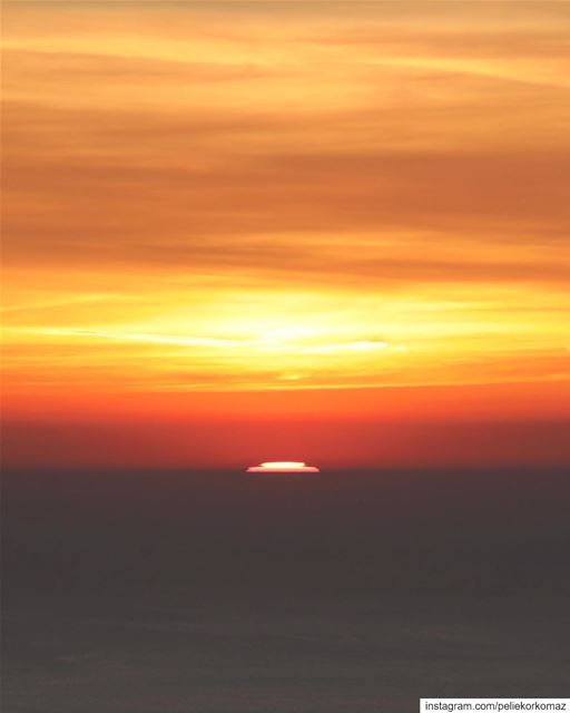 Now she’s lit by the warm orange spreading from the horizon as not-quite-da (جونية - Jounieh)