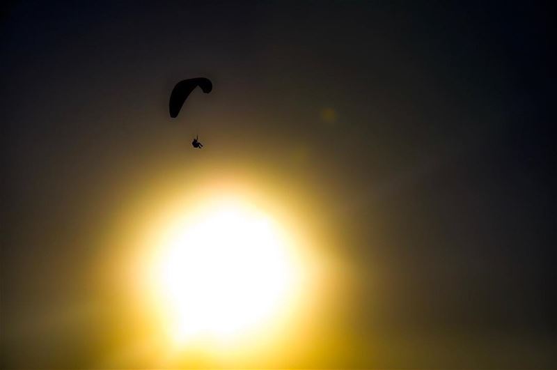 Paragliding above the sun.   sunset  sun  dawn  paragliding  fly  sports ... (Harîssa, Mont-Liban, Lebanon)