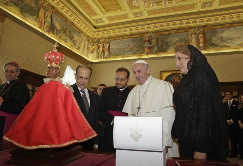 Pope Francis exchanges gifts with President Michel Aoun, at the Vatican. (Alessandra Tarantino / AP) via pow.photos